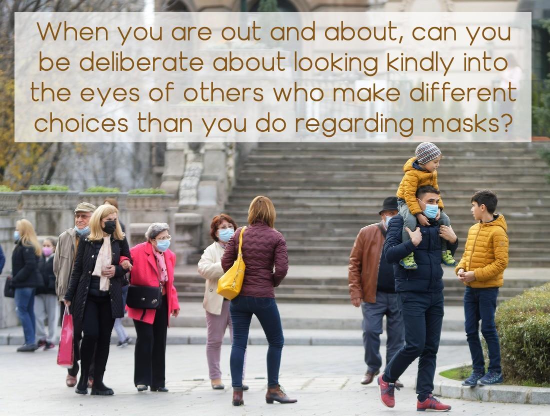 People, masked and non-maksed mingling at bottom of stairs with text: "When you are out and about, can you be deliberate about looking kindly into the eyes of others who make different choices than you do regarding masks?"
