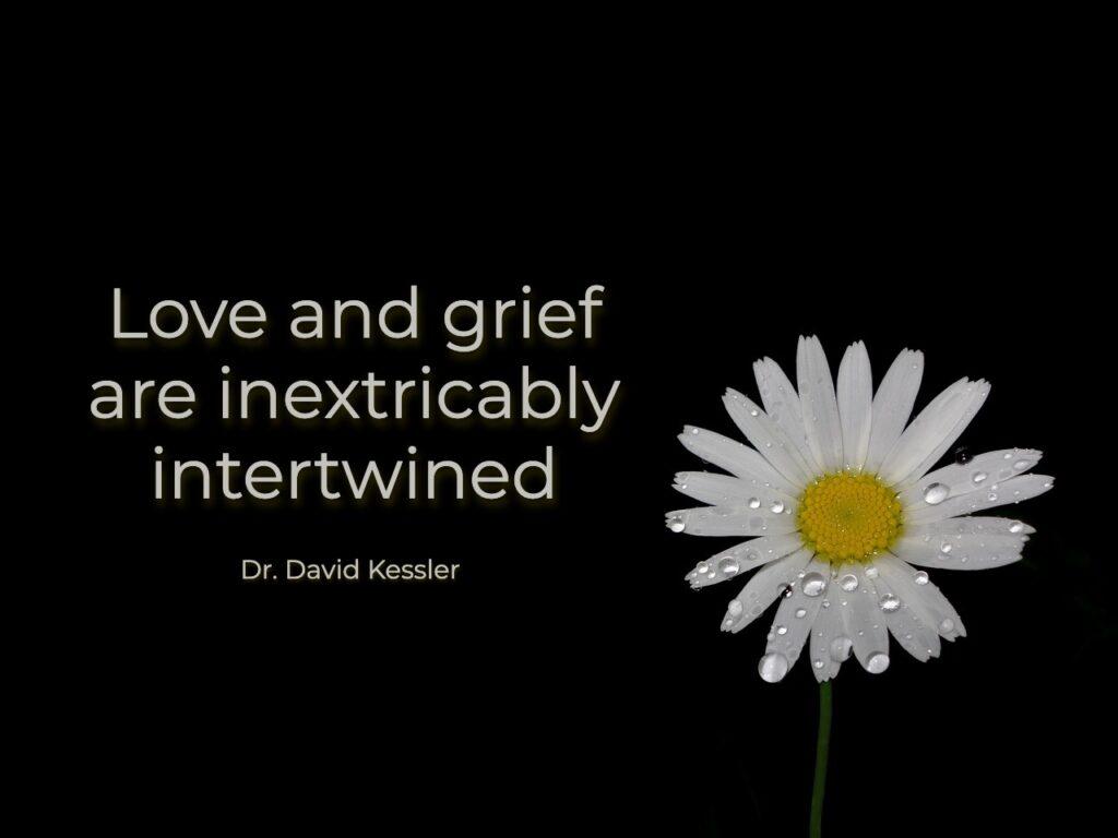Love and grief are inextricably intertwined. Words on a black background. A gerbera daisy, white in color, off the to the side.